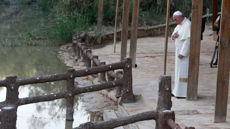 Amman: Private Tour to Madaba, Mount Nebo, and Baptism Site - Bethany Beyond the Jordan (Maghtas): praying at Maghtas in the Jordan Valley