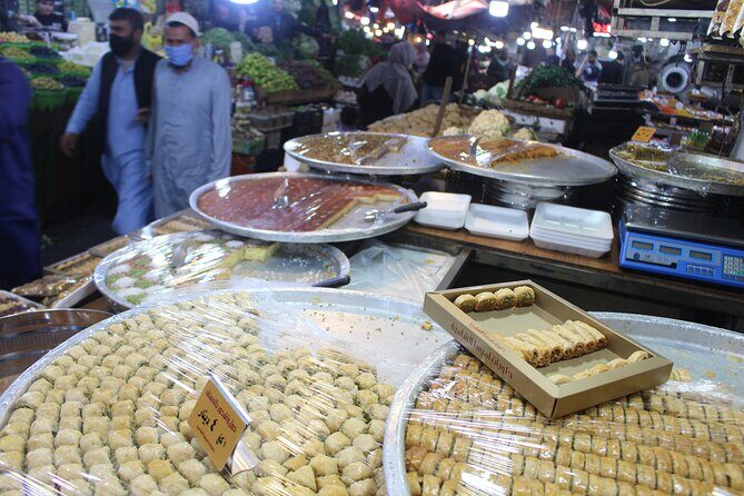 Day or Night Walking Tour in Downtown With Local - Basman Street: spices, perfume-making, and shopping that feels real