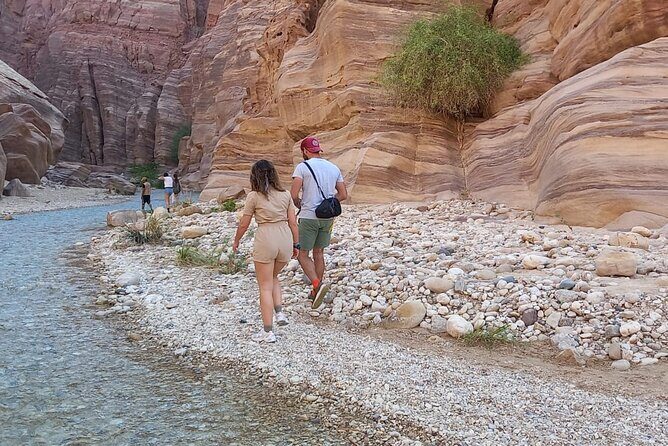 One Day Hiking Wadi Al Hasa Canyon - Reaching the waterfall: shade, stone, and the reward up close