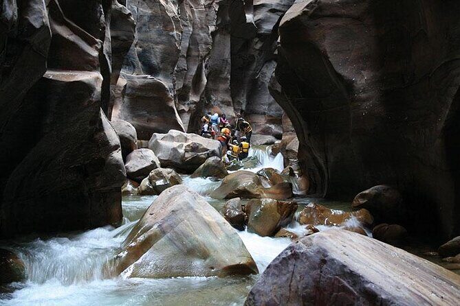 Wadi Al Mujib Adventures From Amman, QAI Airport, Deadsea or Madaba - The “wet adventure” reality: currents, ladders/ropes, and why good shoes matter