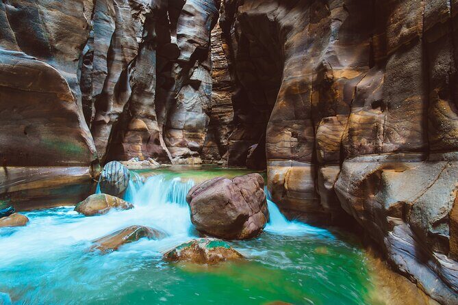 Wadi Mujib Siq Trail with Amman Panoramic&Optional Dead Sea Visit - Reaching the falls: where the walk turns into a water moment