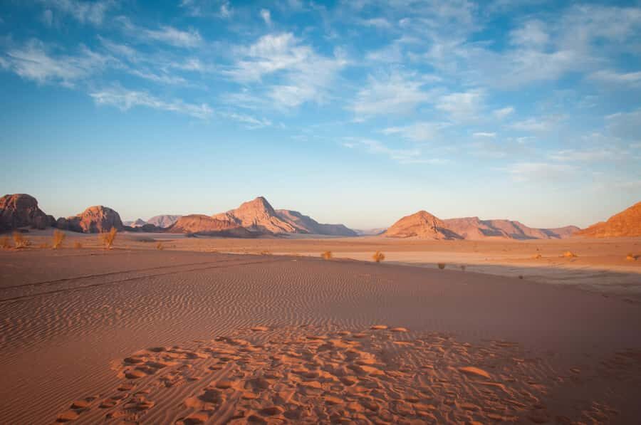 Wadi Rum: Guided Jeep Tour With Overnight Stay and Meals - Lawrence’s Spring to the Red Sand Dune: start with the big drama