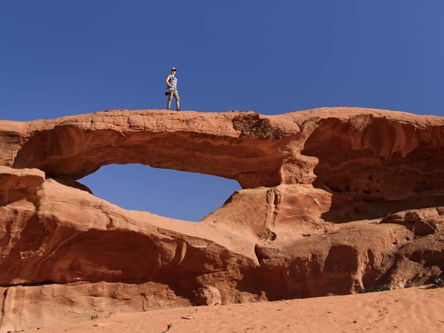 Wadi Rum: Guided Jeep Tour With Overnight Stay and Meals - Narrow passages and iconic arches: why the rock stops matter